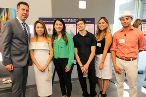 Sociology professor Brian Mayer (at left) with students who focused on South Tucson. The team had many suggestions, including offering GED and resume-building workshops at businesses located in the neighborhoods. Guellermo Arenas (at right) added that it is important to appreciate cultural differences when educating people about finances. (Photo: Anna Augustowska/College of Social and Behavioral Sciences) Sociology professor Brian Mayer (at left) with students who focused on South Tucson. The team had many suggestions, including offering GED and resume-building workshops at businesses located in the neighborhoods. Guellermo Arenas (at right) added that it is important to appreciate cultural differences when educating people about finances. (Photo: Anna Augustowska/College of Social and Behavioral Sciences)